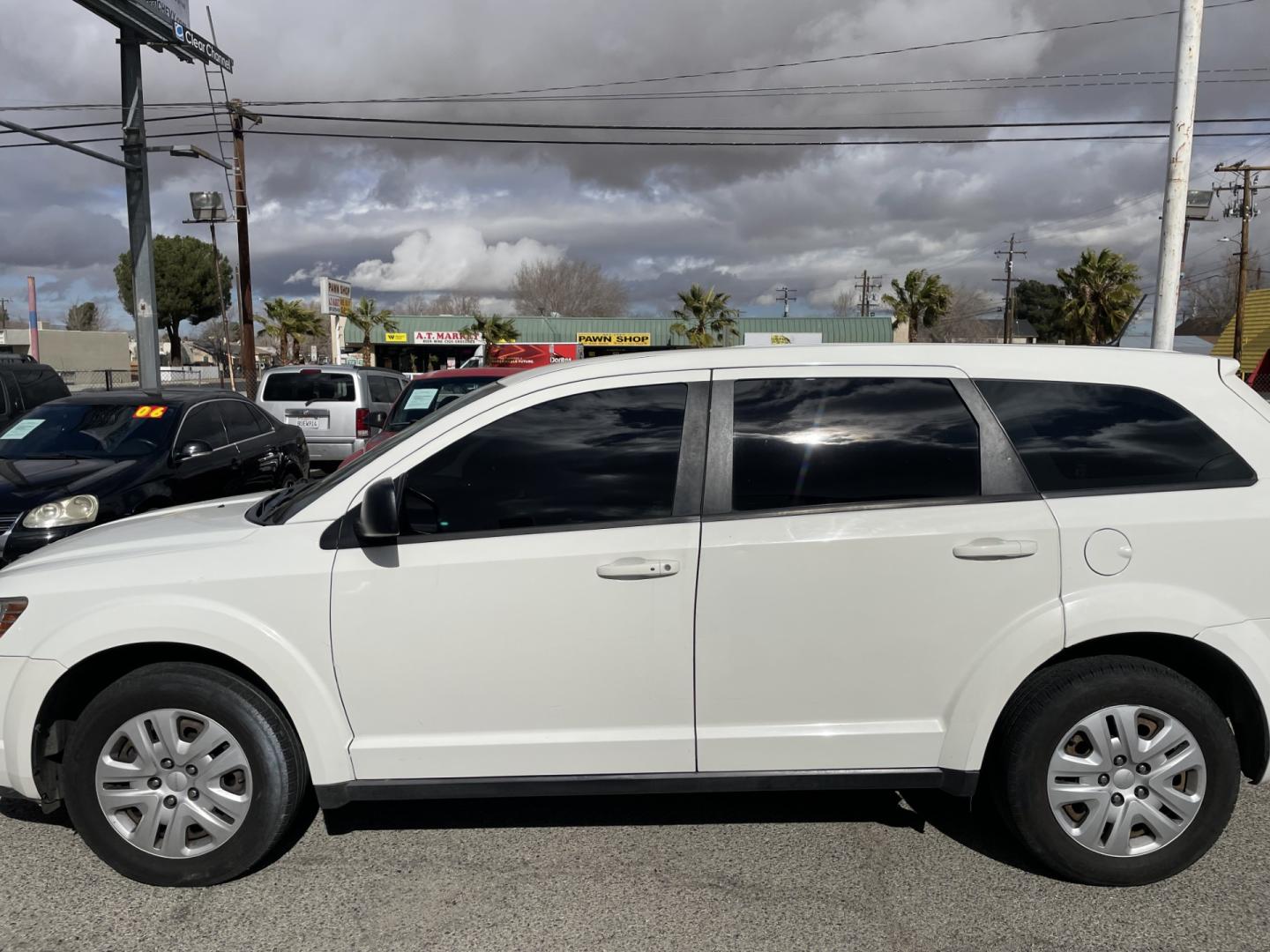 2015 Dodge Journey SE (3C4PDCABXFT) with an 2.4L L4 DOHC 16V engine, 4-Speed Automatic transmission, located at 44356 Date Ave., Lancaster, CA, 93534, (661) 945-6555, 34.688919, -118.139374 - Photo#2