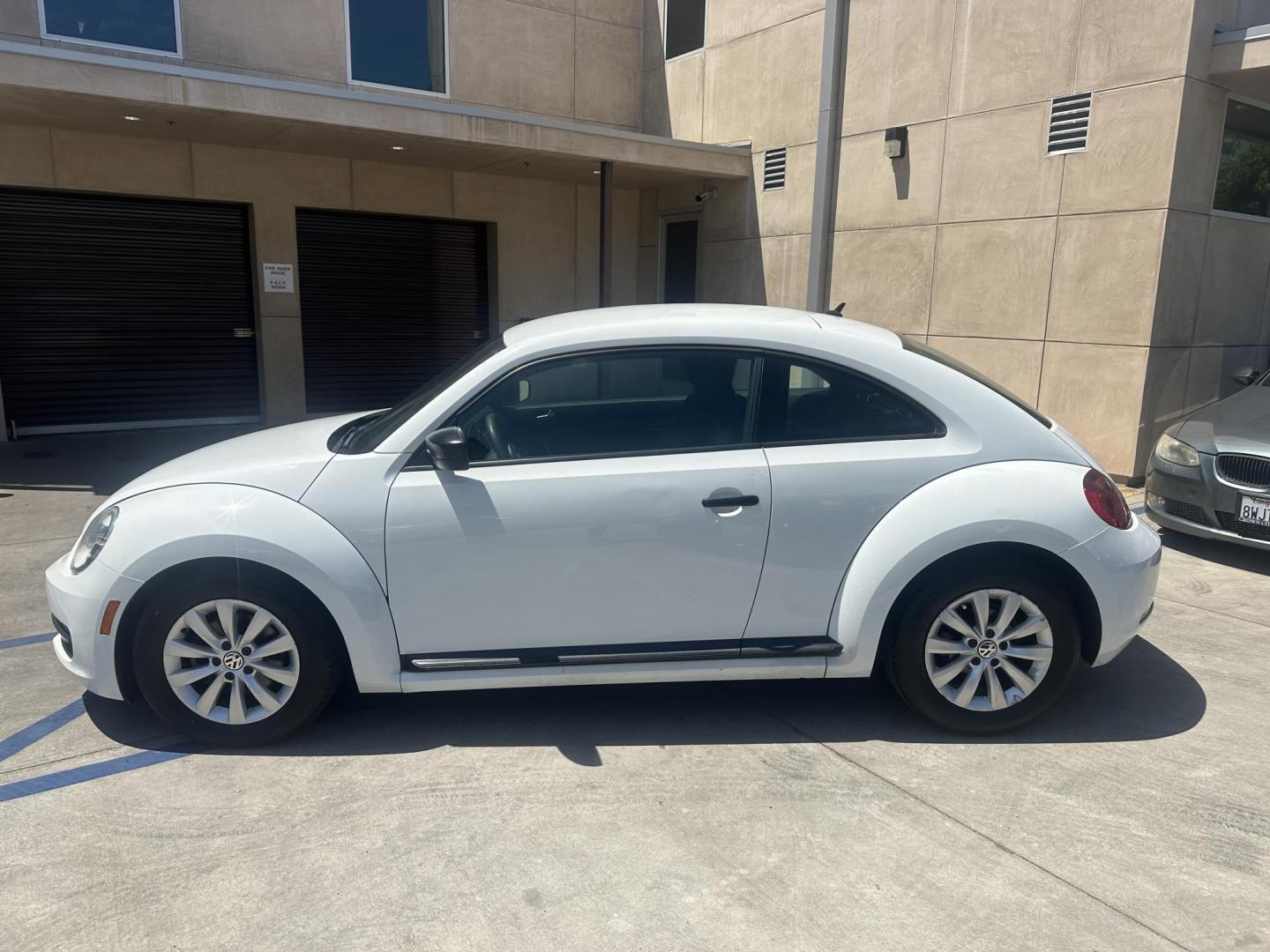 2015 /BLACK Volkswagen Beetle 1.8T (3VWF17AT2FM) with an 1.8L L4 DOHC 16V engine, 6-Speed Automatic transmission, located at 30 S. Berkeley Avenue, Pasadena, CA, 91107, (626) 248-7567, 34.145447, -118.109398 - New Tires! Good MPG! Looks and Drives well! Bad credit? We can help! We are the bank. All our cars are thoroughly inspected and reconditioned by our technicians. FREE CARFAX report. Stop by or call to speak with our friendly staff. Whether you have bad credit, no credit, bankruptcy, or repossessio - Photo#1