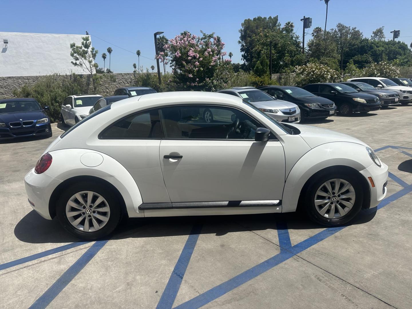 2015 /BLACK Volkswagen Beetle 1.8T (3VWF17AT2FM) with an 1.8L L4 DOHC 16V engine, 6-Speed Automatic transmission, located at 30 S. Berkeley Avenue, Pasadena, CA, 91107, (626) 248-7567, 34.145447, -118.109398 - New Tires! Good MPG! Looks and Drives well! Bad credit? We can help! We are the bank. All our cars are thoroughly inspected and reconditioned by our technicians. FREE CARFAX report. Stop by or call to speak with our friendly staff. Whether you have bad credit, no credit, bankruptcy, or repossessio - Photo#5