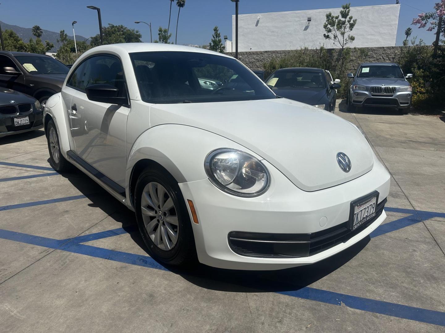 2015 /BLACK Volkswagen Beetle 1.8T (3VWF17AT2FM) with an 1.8L L4 DOHC 16V engine, 6-Speed Automatic transmission, located at 30 S. Berkeley Avenue, Pasadena, CA, 91107, (626) 248-7567, 34.145447, -118.109398 - New Tires! Good MPG! Looks and Drives well! Bad credit? We can help! We are the bank. All our cars are thoroughly inspected and reconditioned by our technicians. FREE CARFAX report. Stop by or call to speak with our friendly staff. Whether you have bad credit, no credit, bankruptcy, or repossessio - Photo#6