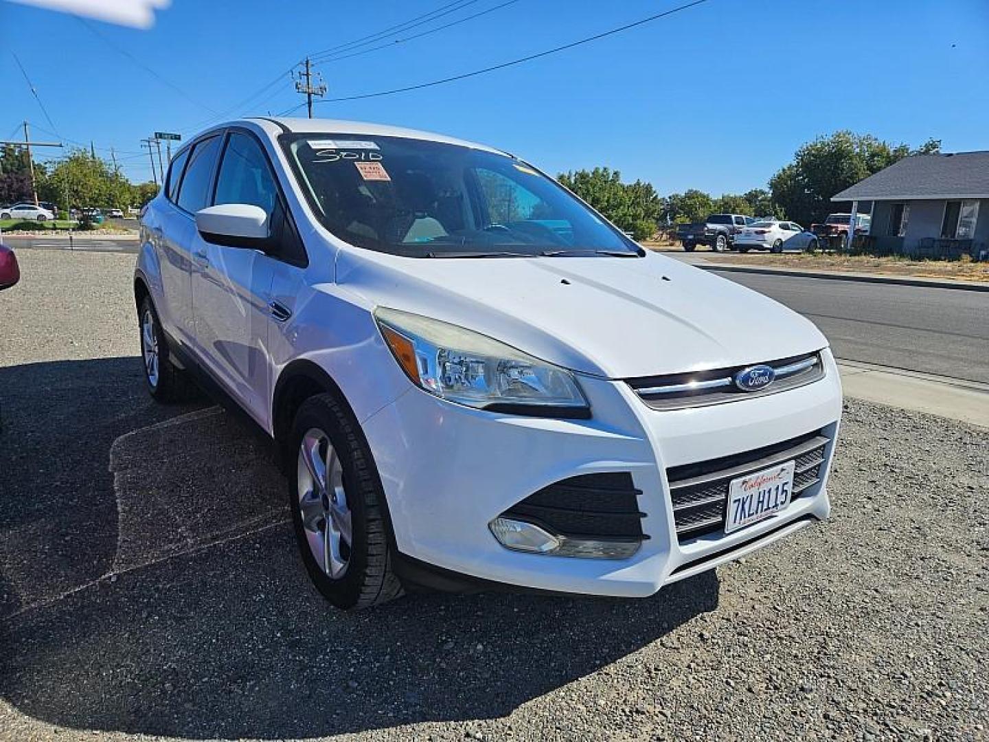 2015 WHITE Ford Escape (1FMCU0GXXFU) with an 4-Cyl EcoBoost 1.6T engine, Auto 6-Spd w/SelShft transmission, located at 246 E Walker St., Orland, 95963, (530) 865-5800, 39.747589, -122.178398 - Photo#1