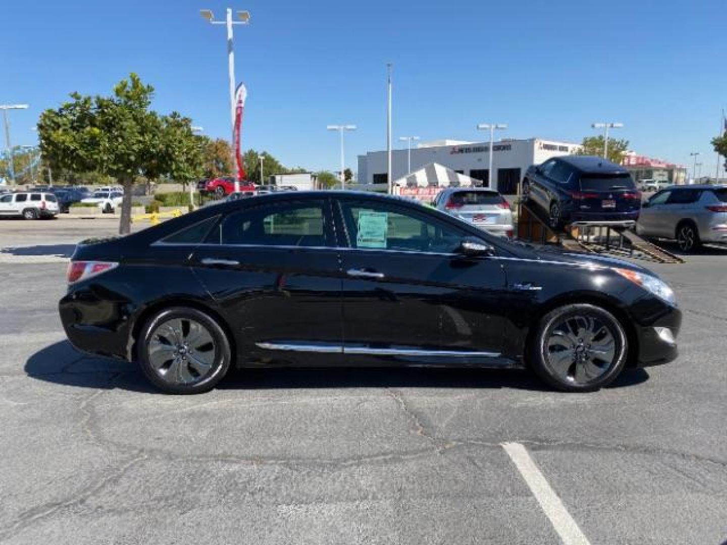 2015 BLACK HYUNDAI SONATA HYBRID (KMHEC4A44FA) , located at 412 Auto Vista Drive, Palmdale, 93551, (661) 945-0620, 34.592636, -118.136681 - Photo#7