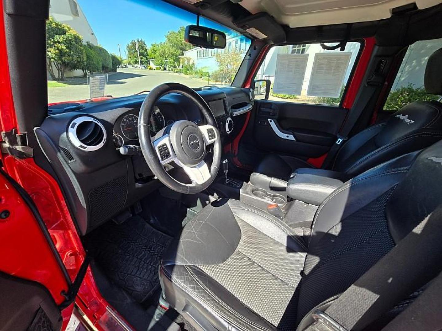 2015 RED Jeep Wrangler Unlimited (1C4BJWEG3FL) with an V6 3.6 Liter engine, Automatic 5-Spd transmission, located at 246 E Walker St., Orland, 95963, (530) 865-5800, 39.747589, -122.178398 - Photo#10