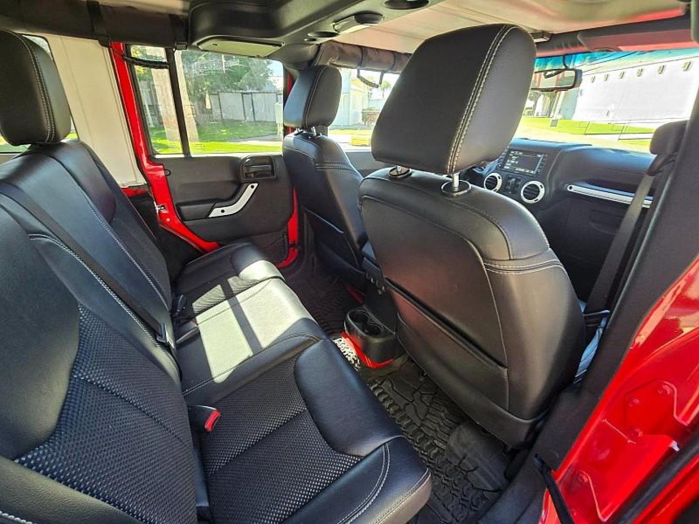 2015 RED Jeep Wrangler Unlimited (1C4BJWEG3FL) with an V6 3.6 Liter engine, Automatic 5-Spd transmission, located at 246 E Walker St., Orland, 95963, (530) 865-5800, 39.747589, -122.178398 - Photo#14