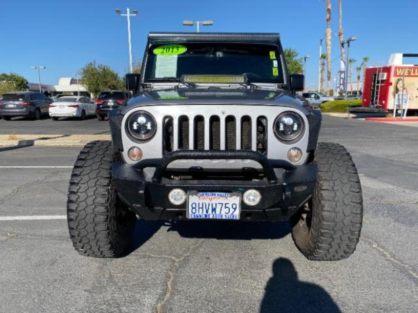 2015 GRAY Jeep Wrangler Unlimited (1C4HJWDG8FL) with an V6 3.6 Liter engine, Automatic transmission, located at 412 Auto Vista Drive, Palmdale, 93551, (661) 945-0620, 34.592636, -118.136681 - Photo#1