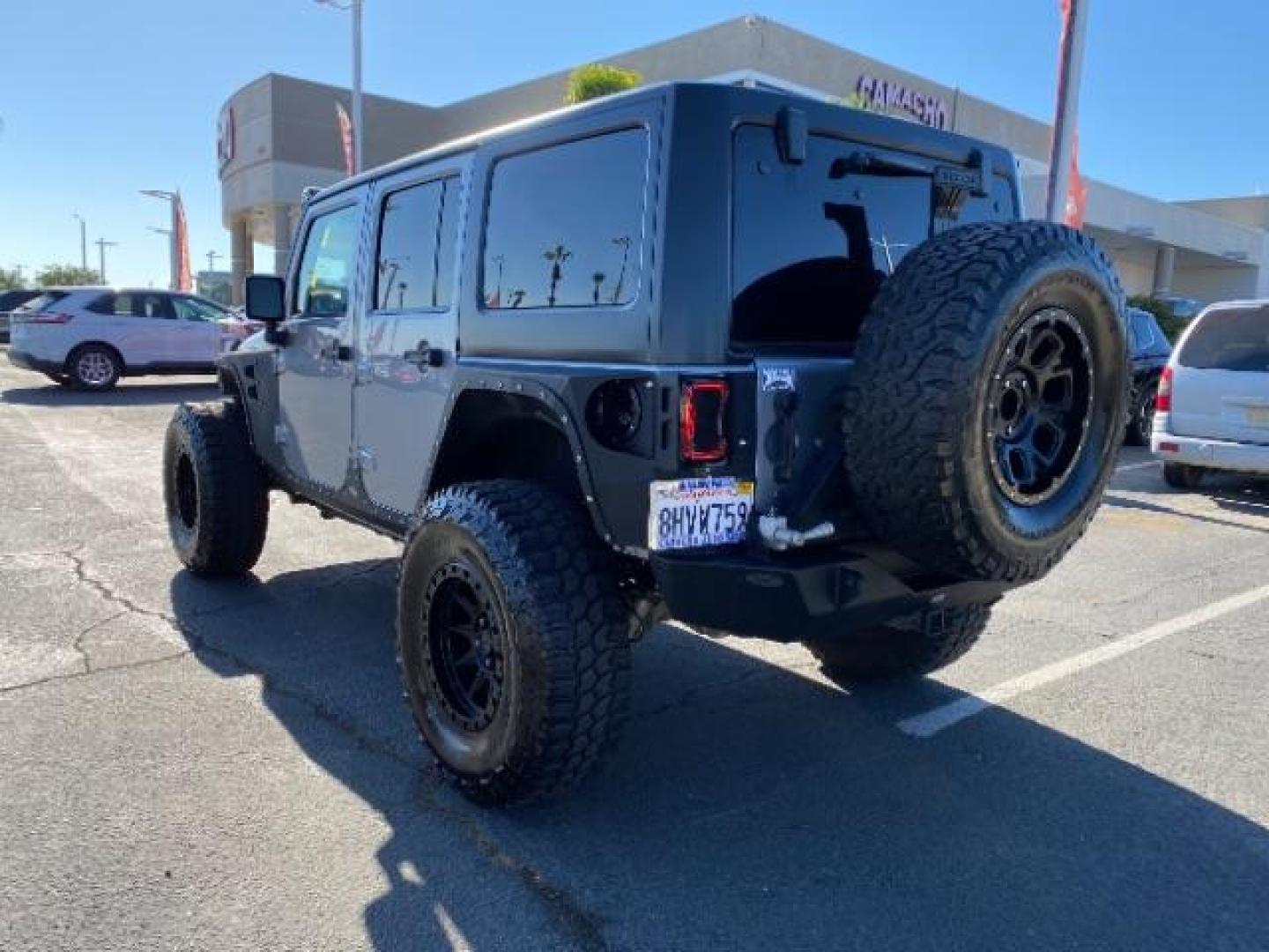 2015 GRAY Jeep Wrangler Unlimited (1C4HJWDG8FL) with an V6 3.6 Liter engine, Automatic transmission, located at 412 Auto Vista Drive, Palmdale, 93551, (661) 945-0620, 34.592636, -118.136681 - Photo#4