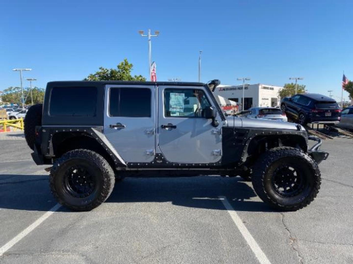 2015 GRAY Jeep Wrangler Unlimited (1C4HJWDG8FL) with an V6 3.6 Liter engine, Automatic transmission, located at 412 Auto Vista Drive, Palmdale, 93551, (661) 945-0620, 34.592636, -118.136681 - Photo#8