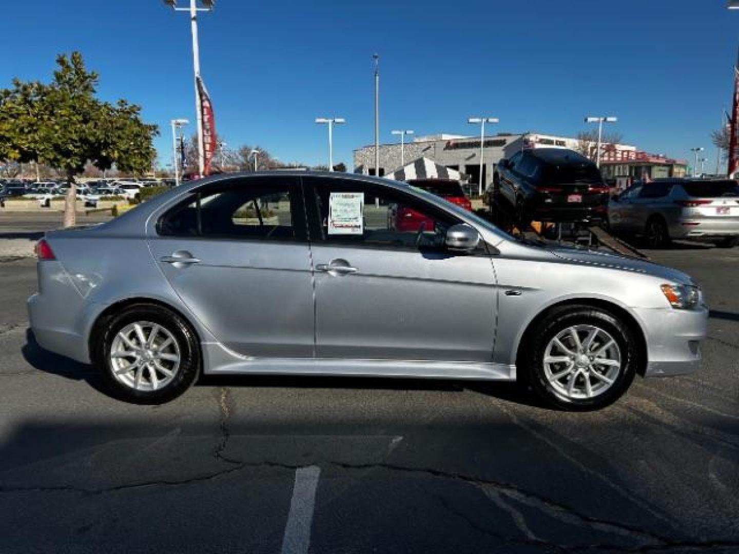 2015 Mitsubishi Lancer (JA32U2FU8FU) with an 4-Cyl 2.0 Liter engine, Automatic CVT transmission, located at 412 Auto Vista Drive, Palmdale, 93551, (661) 945-0620, 34.592636, -118.136681 - Photo#7