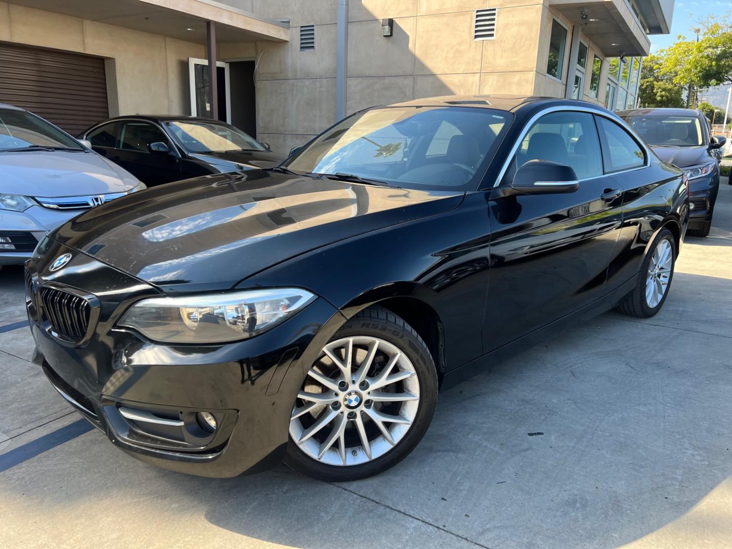 2016 Black BMW 2-Series 228i SULEV Coupe (WBA1F9C51GV) with an 2.0L L4 DOHC 16V engine, 8A transmission, located at 30 S. Berkeley Avenue, Pasadena, CA, 91107, (626) 248-7567, 34.145447, -118.109398 - Crown City Motors is a used “Buy Here Pay Here” car dealer in Pasadena CA. “Buy Here Pay Here” financing, means that when you purchase your vehicle from our dealership, that you make the payments to the dealership as well. We do not need the banks approval to get you approved for a used auto - Photo#0