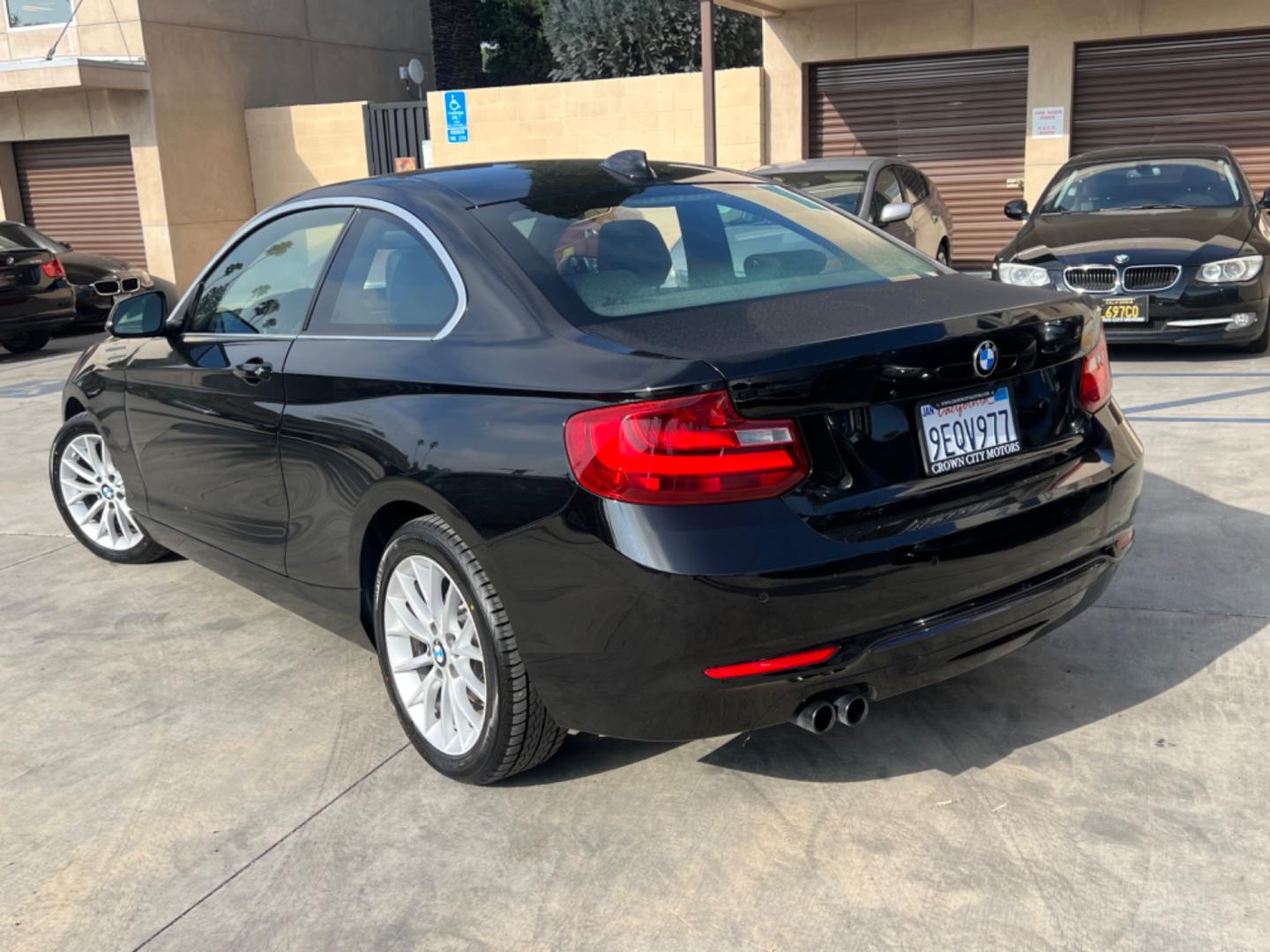 2016 Black BMW 2-Series 228i SULEV Coupe (WBA1F9C51GV) with an 2.0L L4 DOHC 16V engine, 8A transmission, located at 30 S. Berkeley Avenue, Pasadena, CA, 91107, (626) 248-7567, 34.145447, -118.109398 - Crown City Motors is a used “Buy Here Pay Here” car dealer in Pasadena CA. “Buy Here Pay Here” financing, means that when you purchase your vehicle from our dealership, that you make the payments to the dealership as well. We do not need the banks approval to get you approved for a used auto - Photo#2