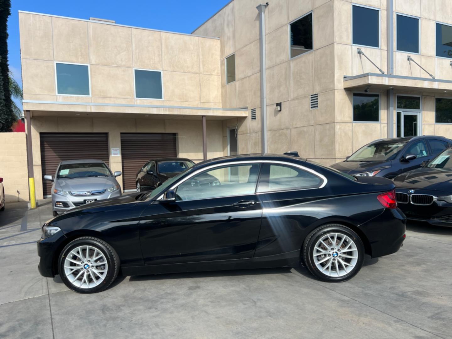 2016 Black BMW 2-Series 228i SULEV Coupe (WBA1F9C51GV) with an 2.0L L4 DOHC 16V engine, 8A transmission, located at 30 S. Berkeley Avenue, Pasadena, CA, 91107, (626) 248-7567, 34.145447, -118.109398 - Crown City Motors is a used “Buy Here Pay Here” car dealer in Pasadena CA. “Buy Here Pay Here” financing, means that when you purchase your vehicle from our dealership, that you make the payments to the dealership as well. We do not need the banks approval to get you approved for a used auto - Photo#3