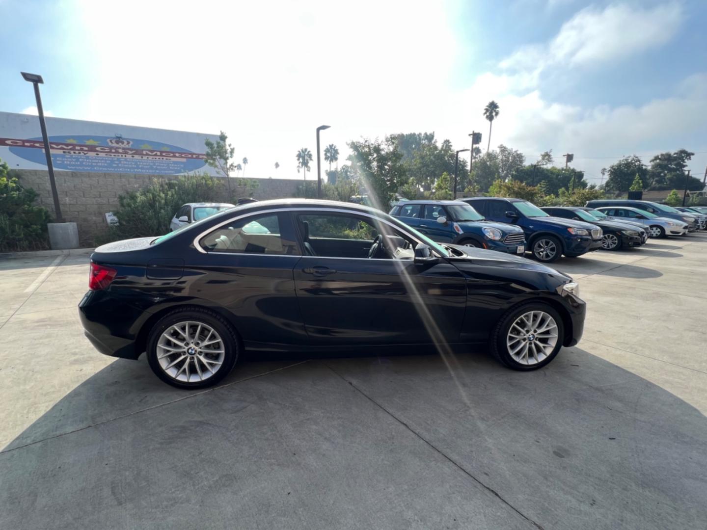 2016 Black BMW 2-Series 228i SULEV Coupe (WBA1F9C51GV) with an 2.0L L4 DOHC 16V engine, 8A transmission, located at 30 S. Berkeley Avenue, Pasadena, CA, 91107, (626) 248-7567, 34.145447, -118.109398 - Crown City Motors is a used “Buy Here Pay Here” car dealer in Pasadena CA. “Buy Here Pay Here” financing, means that when you purchase your vehicle from our dealership, that you make the payments to the dealership as well. We do not need the banks approval to get you approved for a used auto - Photo#6