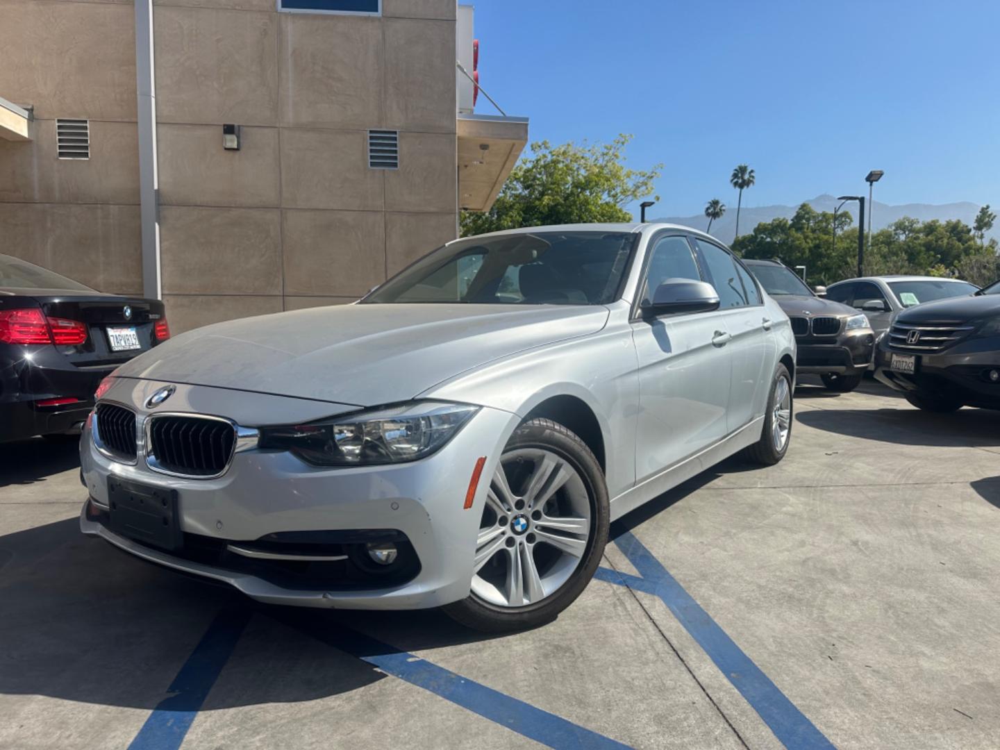 2016 Silver Metallic /Black BMW 3-Series (WBA8E3G50GN) , located at 30 S. Berkeley Avenue, Pasadena, CA, 91107, (626) 248-7567, 34.145447, -118.109398 - Navigation!! Monn-roof!! Back-up camera! Discover the 2016 BMW 328 xDrive with Navigation, Back-Up Camera, and More! Are you in the market for cheap cars or affordable cars that combine luxury, performance, and advanced features? Look no further than the 2016 BMW 328 xDrive, a remarkable vehicle - Photo#0