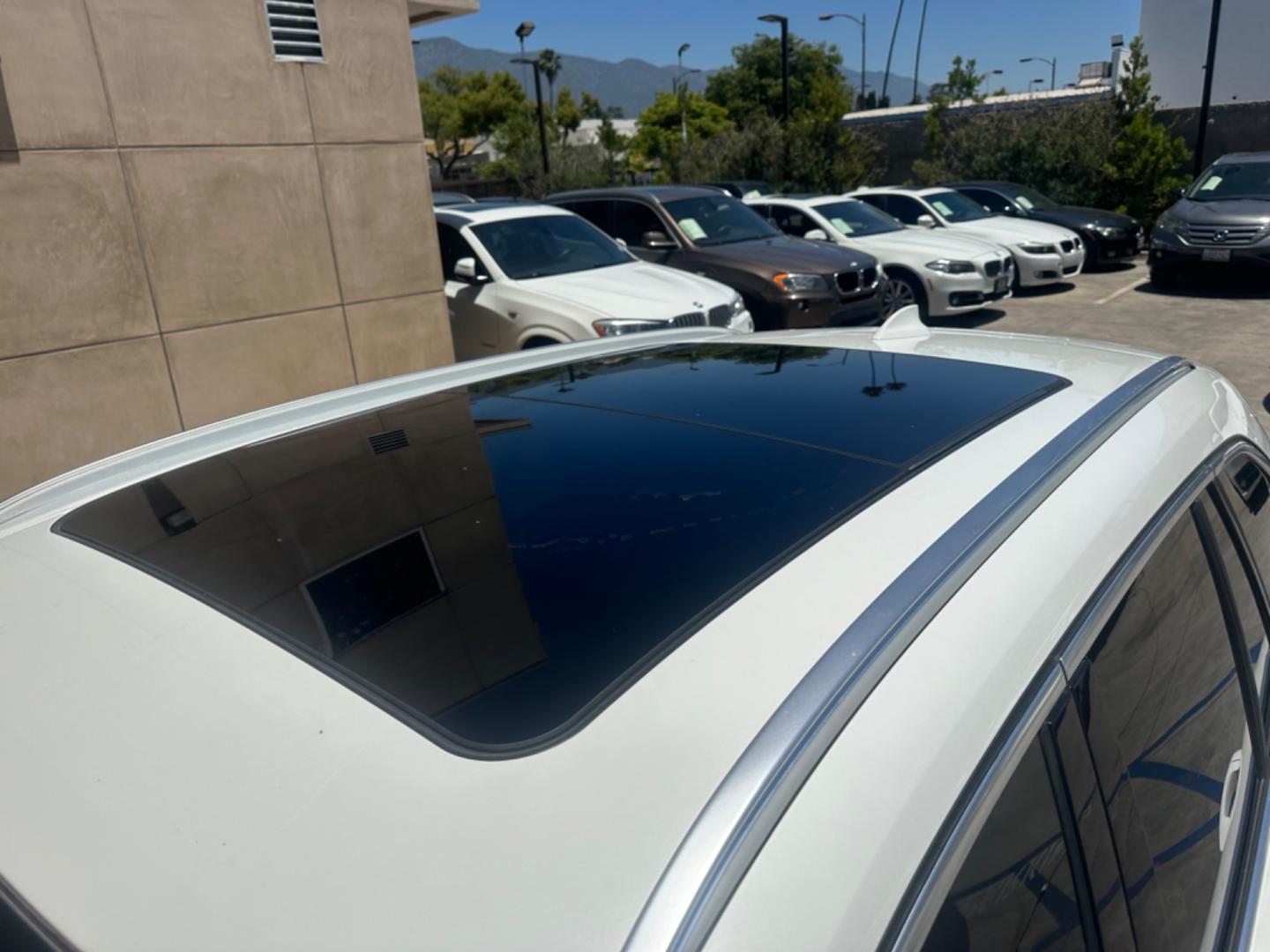 2016 WHITE /Black BMW X1 Leather (WBXHT3C30GP) with an 2.0 engine, Automatic transmission, located at 30 S. Berkeley Avenue, Pasadena, CA, 91107, (626) 248-7567, 34.145447, -118.109398 - Photo#25