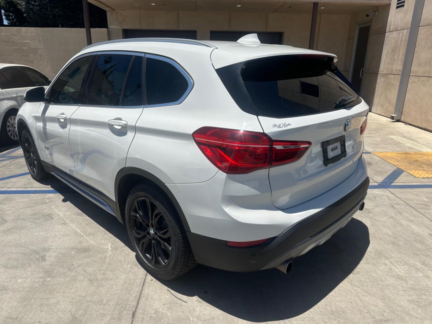 2016 WHITE /Black BMW X1 Leather (WBXHT3C30GP) with an 2.0 engine, Automatic transmission, located at 30 S. Berkeley Avenue, Pasadena, CA, 91107, (626) 248-7567, 34.145447, -118.109398 - Photo#2