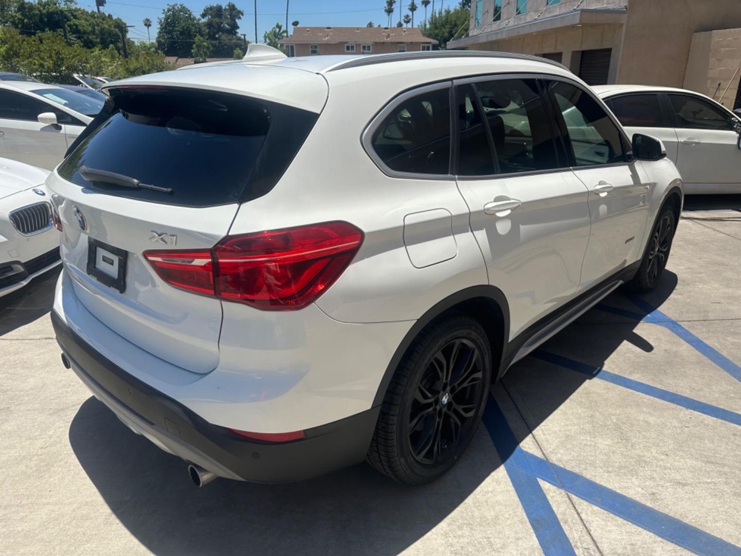 2016 WHITE /Black BMW X1 Leather (WBXHT3C30GP) with an 2.0 engine, Automatic transmission, located at 30 S. Berkeley Avenue, Pasadena, CA, 91107, (626) 248-7567, 34.145447, -118.109398 - Photo#4