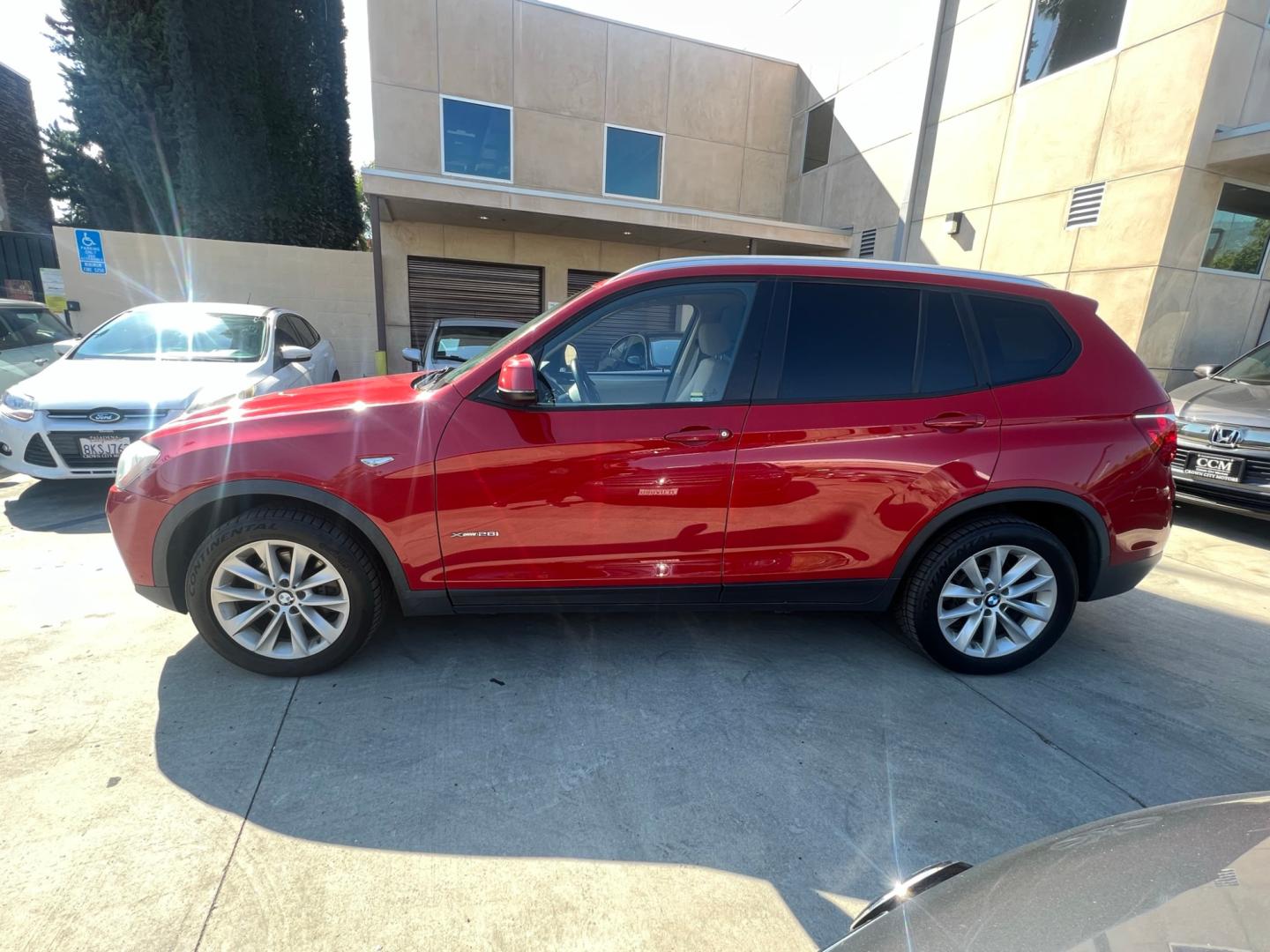 2016 RED /Tan BMW X3 xDrive28i (5UXWX9C50G0) with an 2.0L L4 DOHC 16V engine, 8-Speed Automatic transmission, located at 30 S. Berkeley Avenue, Pasadena, CA, 91107, (626) 248-7567, 34.145447, -118.109398 - Crown City Motors is a used “Buy Here Pay Here” car dealer in Pasadena CA. “Buy Here Pay Here” financing, means that when you purchase your vehicle from our dealership, that you make the payments to the dealership as well. We do not need the banks approval to get you approved for a used auto - Photo#1