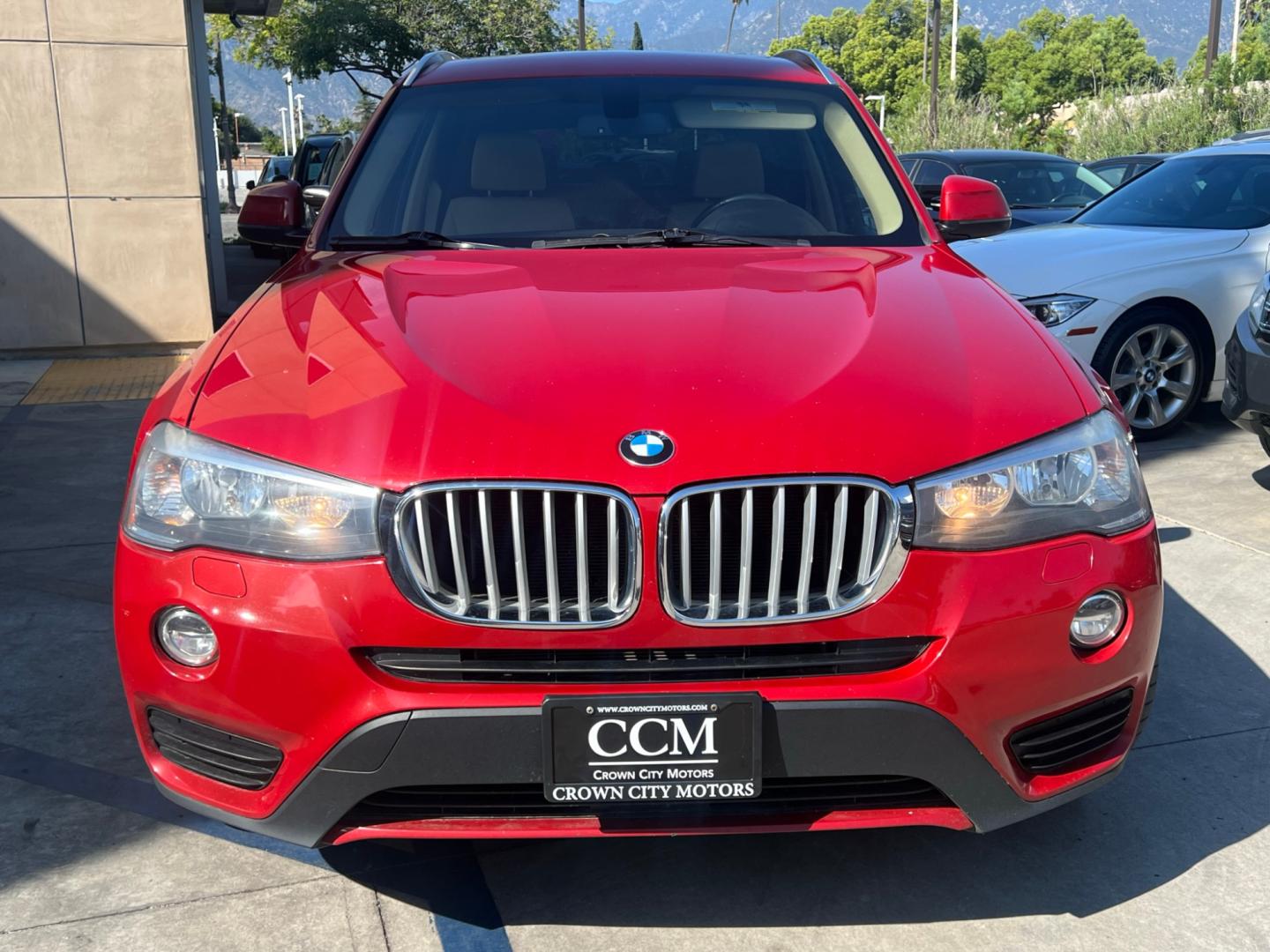 2016 RED /Tan BMW X3 xDrive28i (5UXWX9C50G0) with an 2.0L L4 DOHC 16V engine, 8-Speed Automatic transmission, located at 30 S. Berkeley Avenue, Pasadena, CA, 91107, (626) 248-7567, 34.145447, -118.109398 - Crown City Motors is a used “Buy Here Pay Here” car dealer in Pasadena CA. “Buy Here Pay Here” financing, means that when you purchase your vehicle from our dealership, that you make the payments to the dealership as well. We do not need the banks approval to get you approved for a used auto - Photo#5