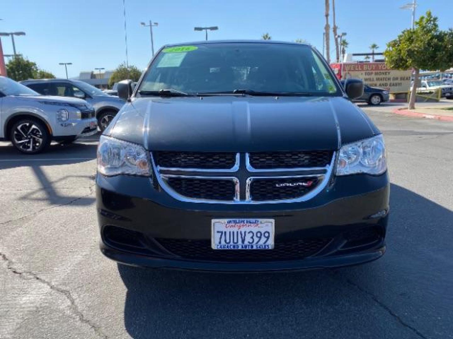 2016 BLACK Dodge Grand Caravan (2C4RDGBG5GR) with an V6 Flex Fuel 3.6 Liter engine, Automatic 6-Spd transmission, located at 412 Auto Vista Drive, Palmdale, 93551, (661) 945-0620, 34.592636, -118.136681 - Photo#2