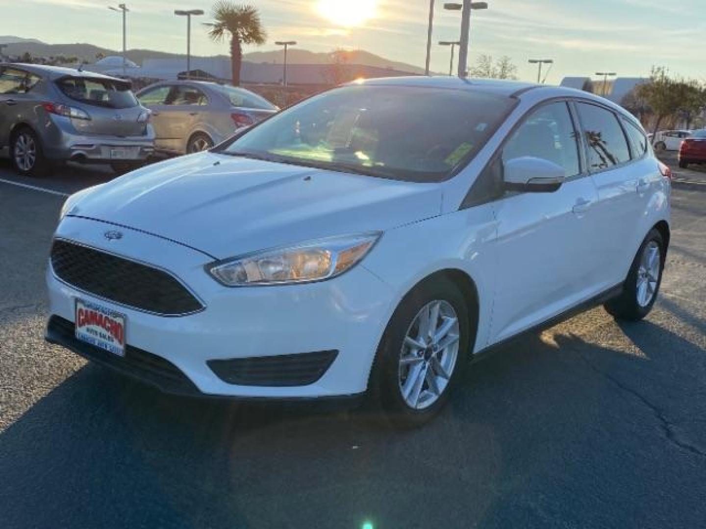 2016 WHITE Ford Focus (1FADP3K25GL) with an 4-Cyl Flex Fuel 2.0L engine, Manual 5-Spd transmission, located at 412 Auto Vista Drive, Palmdale, 93551, (661) 945-0620, 34.592636, -118.136681 - Photo#2