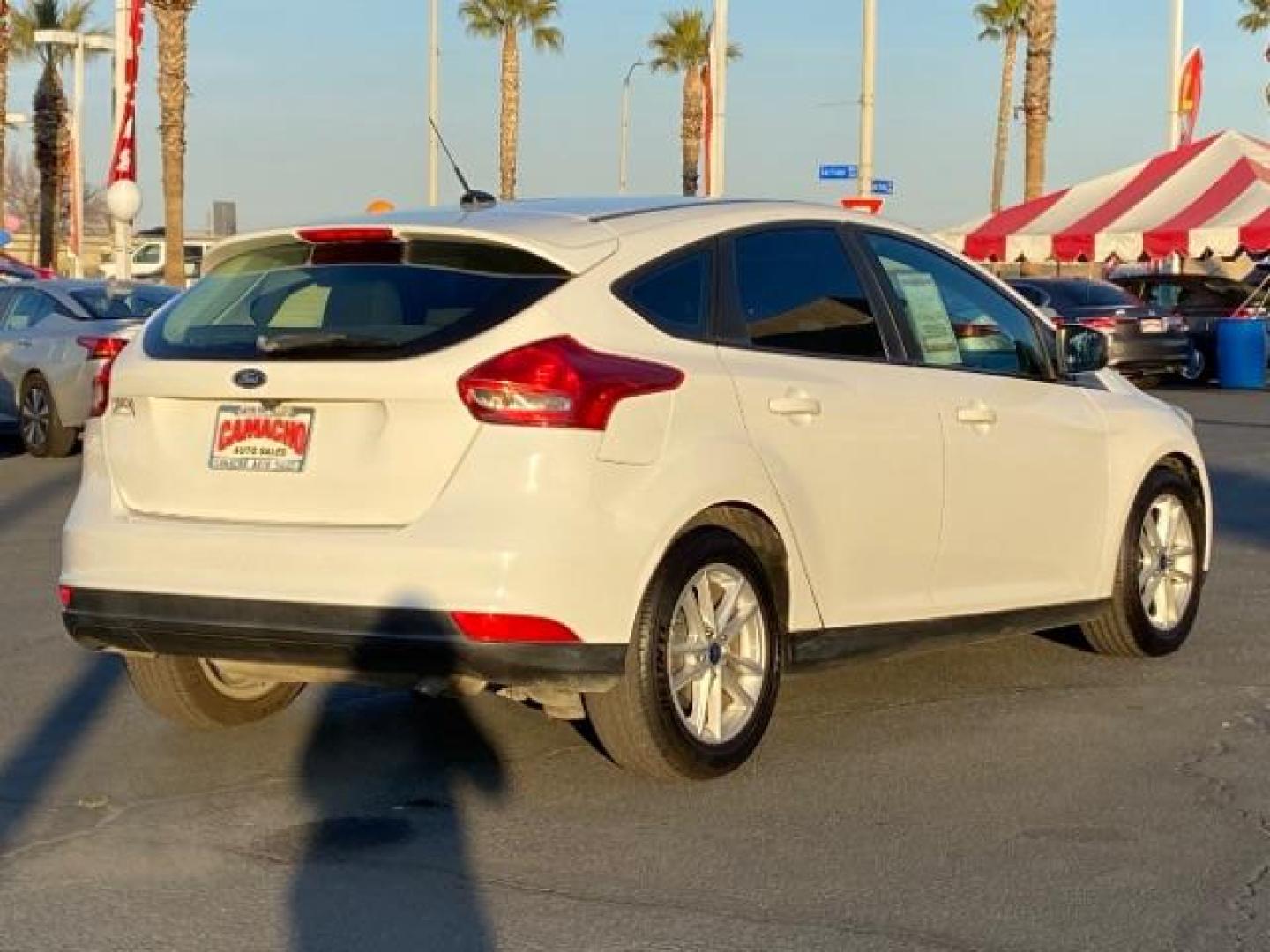 2016 WHITE Ford Focus (1FADP3K25GL) with an 4-Cyl Flex Fuel 2.0L engine, Manual 5-Spd transmission, located at 412 Auto Vista Drive, Palmdale, 93551, (661) 945-0620, 34.592636, -118.136681 - Photo#5