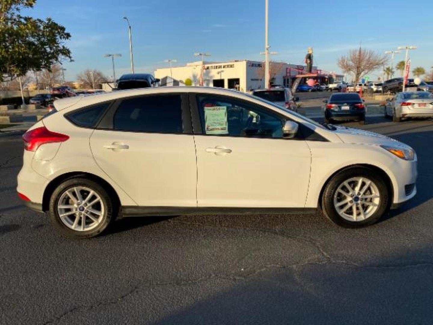 2016 WHITE Ford Focus (1FADP3K25GL) with an 4-Cyl Flex Fuel 2.0L engine, Manual 5-Spd transmission, located at 412 Auto Vista Drive, Palmdale, 93551, (661) 945-0620, 34.592636, -118.136681 - Photo#6