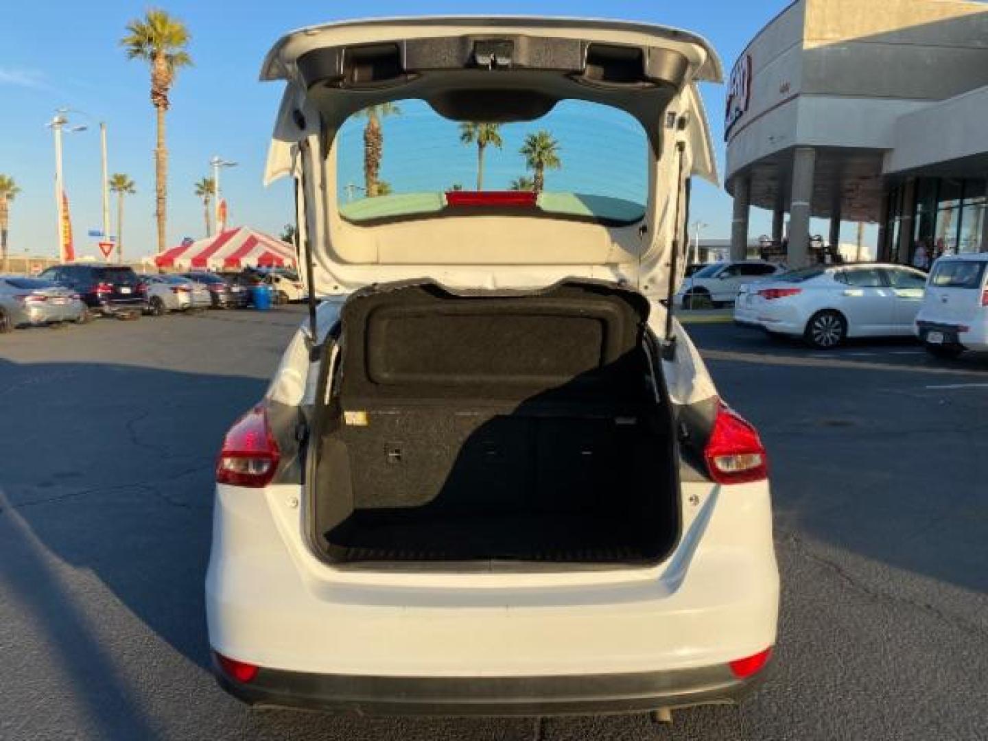 2016 WHITE Ford Focus (1FADP3K25GL) with an 4-Cyl Flex Fuel 2.0L engine, Manual 5-Spd transmission, located at 412 Auto Vista Drive, Palmdale, 93551, (661) 945-0620, 34.592636, -118.136681 - Photo#13