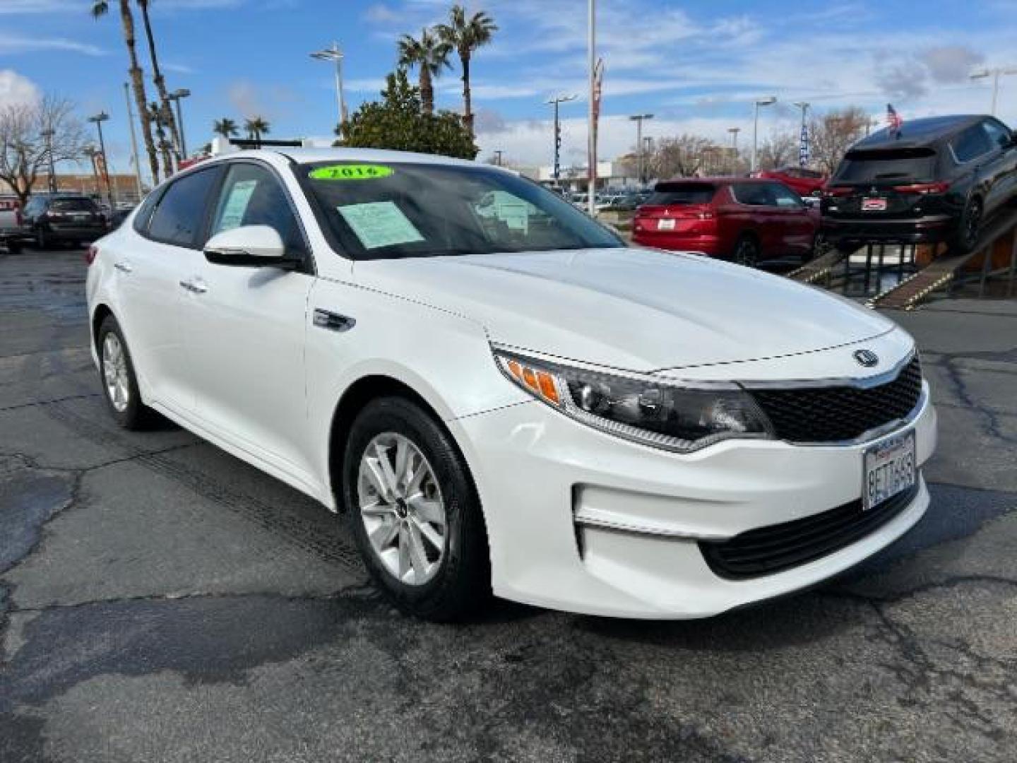 2016 WHITE Kia Optima (KNAGT4L33G5) with an 4-Cyl 2.4 Liter engine, Auto 6-Spd Sportmatic transmission, located at 412 Auto Vista Drive, Palmdale, 93551, (661) 945-0620, 34.592636, -118.136681 - Photo#0