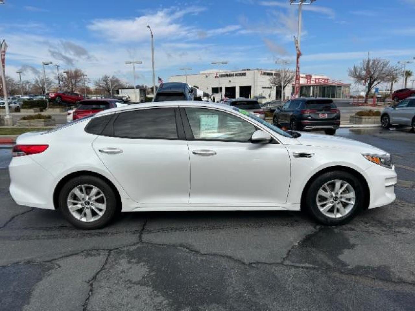 2016 WHITE Kia Optima (KNAGT4L33G5) with an 4-Cyl 2.4 Liter engine, Auto 6-Spd Sportmatic transmission, located at 412 Auto Vista Drive, Palmdale, 93551, (661) 945-0620, 34.592636, -118.136681 - Photo#7