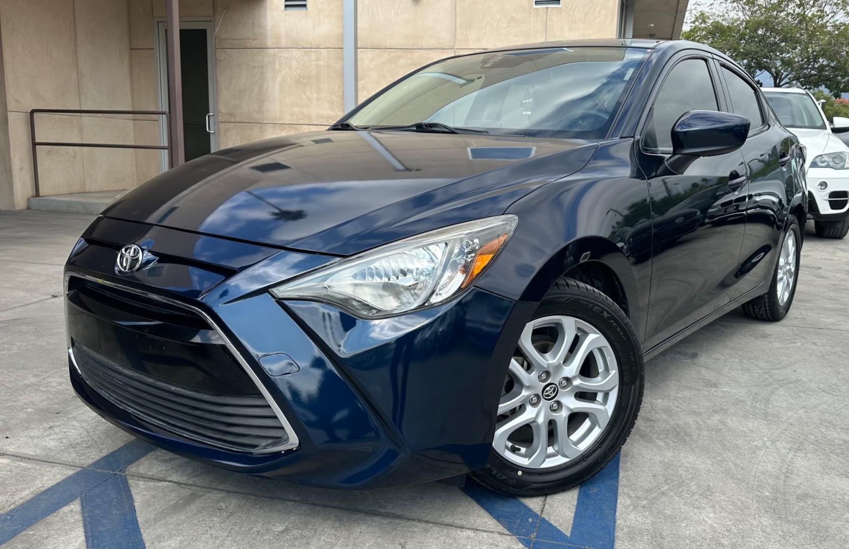 2017 BLUE /Black Scion Yaris iA 6M (3MYDLBYV9HY) with an 1.5L L4 DOHC 16V engine, Automatic transmission, located at 30 S. Berkeley Avenue, Pasadena, CA, 91107, (626) 248-7567, 34.145447, -118.109398 - New Tires! Low Miles! 2017 Scion Yaris iA - Drive with Confidence in Pasadena, CA On the hunt for top-notch BHPH cars in Pasadena, CA? Introducing the 2017 Scion Yaris iA. As a leading BHPH dealer in Los Angeles, CA, we are thrilled to feature this gem amongst our collection of pre-owned autos in - Photo#0