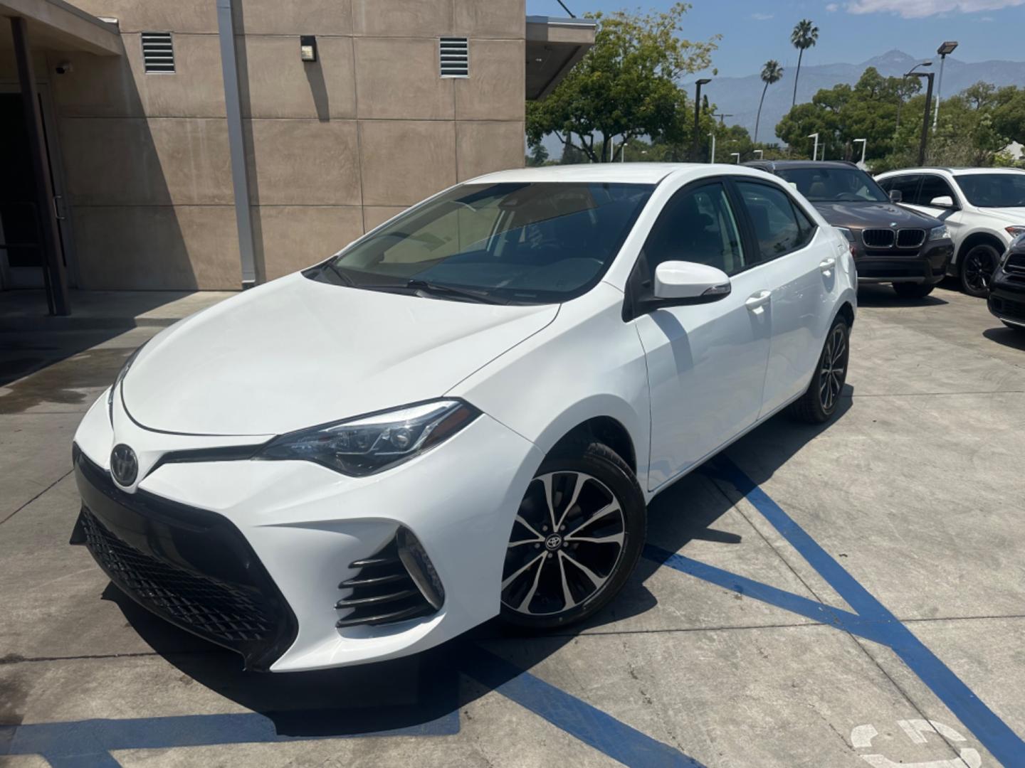 2017 WHITE /Black Toyota Corolla Cloth (2T1BURHE2HC) with an 4 Cylinder engine, Automatic transmission, located at 30 S. Berkeley Avenue, Pasadena, CA, 91107, (626) 248-7567, 34.145447, -118.109398 - Photo#1