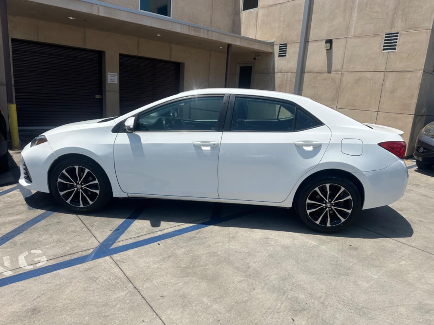 2017 WHITE /Black Toyota Corolla Cloth (2T1BURHE2HC) with an 4 Cylinder engine, Automatic transmission, located at 30 S. Berkeley Avenue, Pasadena, CA, 91107, (626) 248-7567, 34.145447, -118.109398 - Photo#2