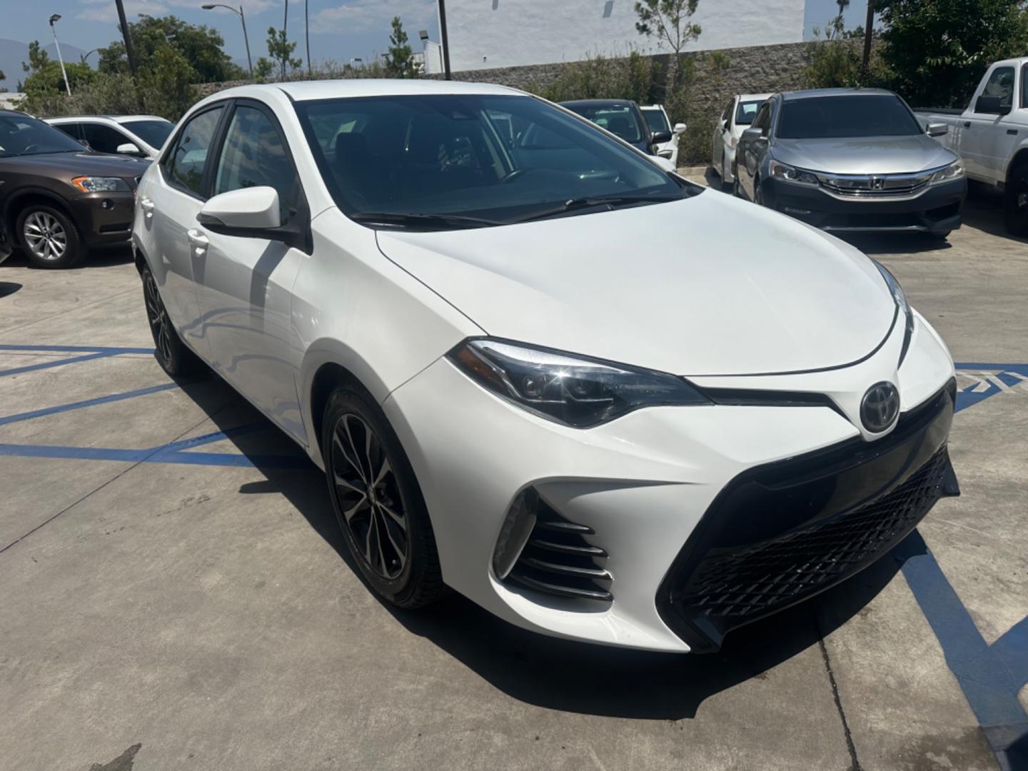 2017 WHITE /Black Toyota Corolla Cloth (2T1BURHE2HC) with an 4 Cylinder engine, Automatic transmission, located at 30 S. Berkeley Avenue, Pasadena, CA, 91107, (626) 248-7567, 34.145447, -118.109398 - Photo#7