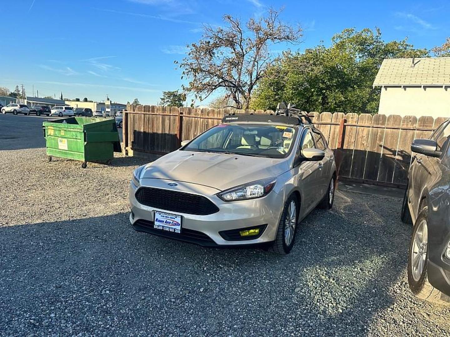 2017 GOLD Ford Focus (1FADP3N23HL) with an 4-Cyl Flex Fuel 2.0L engine, Auto 6-Spd Power/Select transmission, located at 246 E Walker St., Orland, 95963, (530) 865-5800, 39.747589, -122.178398 - Photo#0