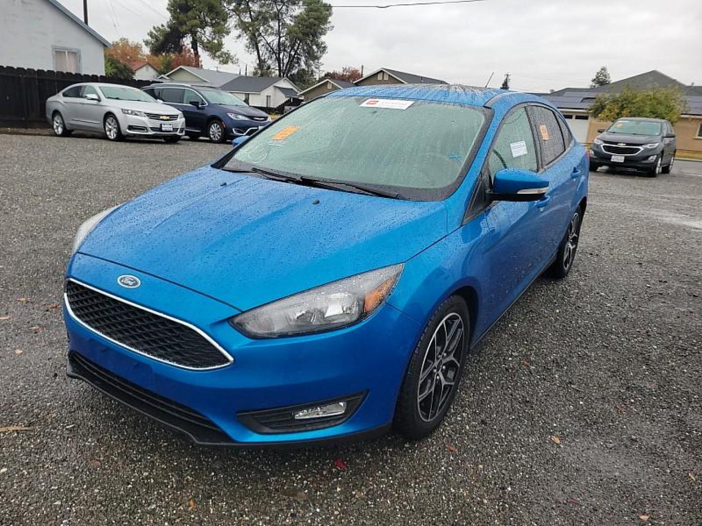 2017 BLUE Ford Focus (1FADP3H21HL) with an 4-Cyl Flex Fuel 2.0L engine, Auto 6-Spd Power/Select transmission, located at 246 E Walker St., Orland, 95963, (530) 865-5800, 39.747589, -122.178398 - Photo#0