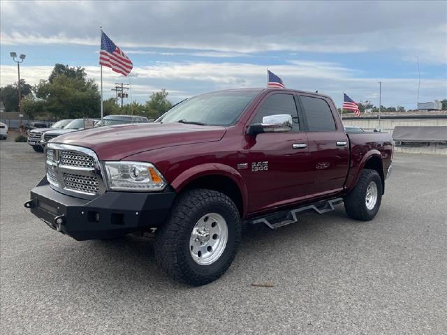 2017 Delmonico Red Pearl Coat RAM 1500 Laramie (1C6RR7NT6HS) with an 5.7L HEMI 5.7L V8 395hp 410ft. lbs. Sequential Multiport Fuel Injection engine, 8-Speed Shiftable Automatic transmission, located at 800 Riverside Ave, Roseville, CA, 95678, 916-773-4549 & Toll Free: 866-719-4393, 38.732265, -121.291039 - 4X4 CREW CAB LARAMIE 5.7 HEMI V8 CLEAN CARFAX - Photo#0