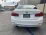 2018 Alpine White /Black BMW 3-Series 330i SULEV Sedan (WBA8B9C56JA) with an 3.0L L6 DOHC 24V engine, 8A transmission, located at 30 S. Berkeley Avenue, Pasadena, CA, 91107, (626) 248-7567, 34.145447, -118.109398 - The 2018 BMW 3-Series 330i SULEV Sedan embodies luxury, performance, and environmental responsibility. Under the hood, it boasts a 2.0L TwinPower Turbo inline-4 engine, generating an impressive 248 horsepower and 258 lb-ft of torque. This powertrain ensures swift acceleration and a responsive drivin - Photo#2