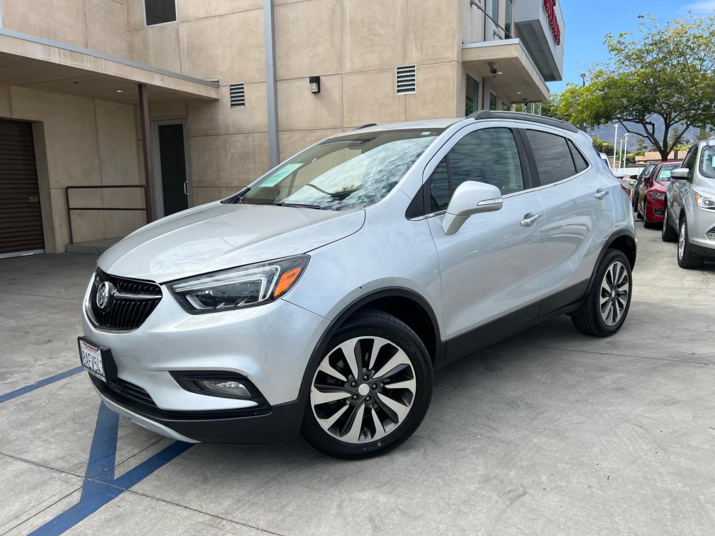 2018 Silver Buick Encore Essence AWD (KL4CJGSB7JB) with an 1.4L L4 DOHC 16V TURBO engine, 6A transmission, located at 30 S. Berkeley Avenue, Pasadena, CA, 91107, (626) 248-7567, 34.145447, -118.109398 - Crown City Motors is a used “Buy Here Pay Here” car dealer in Pasadena CA. “Buy Here Pay Here” financing, means that when you purchase your vehicle from our dealership, that you make the payments to the dealership as well. We do not need the banks approval to get you approved for a used auto - Photo#0