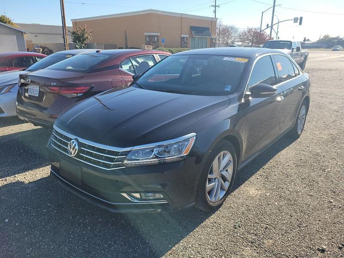 2018 BLACK Volkswagen Passat (1VWBA7A35JC) with an 4-Cyl Turbo 2.0 Liter engine, Auto 6-Spd Tiptronic Spt transmission, located at 246 E Walker St., Orland, 95963, (530) 865-5800, 39.747589, -122.178398 - Photo#0