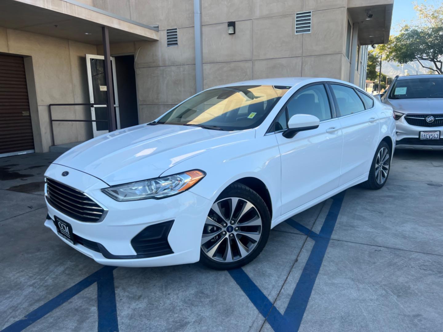 2019 White /Black Ford Fusion SE AWD (3FA6P0T98KR) with an 2.0L L4 DOHC 16V engine, 6A transmission, located at 30 S. Berkeley Avenue, Pasadena, CA, 91107, (626) 248-7567, 34.145447, -118.109398 - Navigation! Premium Wheels! Bad Credit? We can help! We are the bank. 2019 Ford Fusion SE AWD: The Perfect Choice for Pasadena Drivers If you're in the vibrant heart of Pasadena, CA and on the lookout for an exceptional vehicle, allow us to introduce the 2019 Ford Fusion SE AWD. Not just another - Photo#0