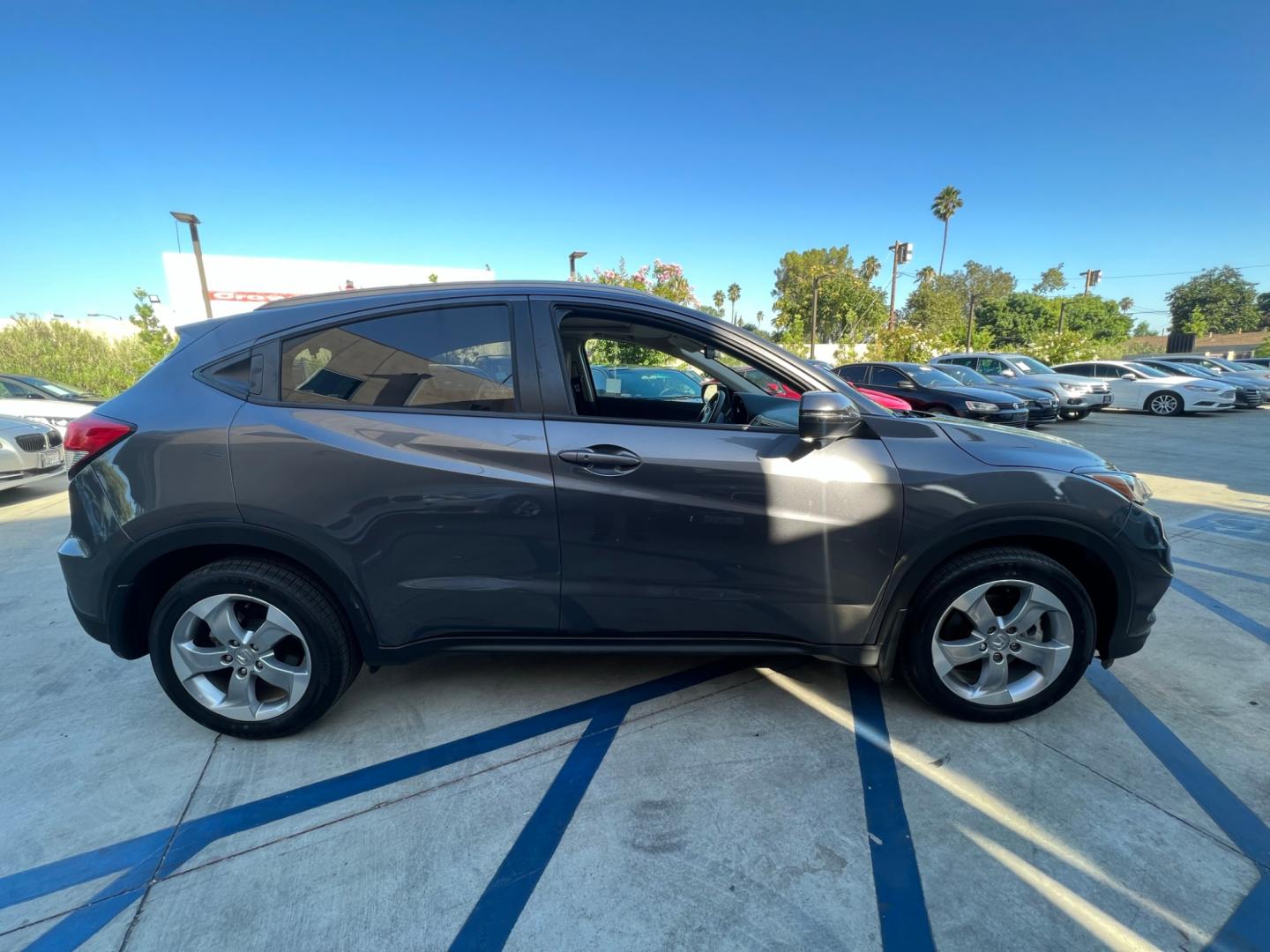 2019 Gray Honda HR-V EX (3CZRU5H51KM) with an 1.8L L4 DOHC 16V engine, CVT transmission, located at 30 S. Berkeley Avenue, Pasadena, CA, 91107, (626) 248-7567, 34.145447, -118.109398 - Crown City Motors is a used “Buy Here Pay Here” car dealer in Pasadena CA. “Buy Here Pay Here” financing, means that when you purchase your vehicle from our dealership, that you make the payments to the dealership as well. We do not need the banks approval to get you approved for a used auto - Photo#5