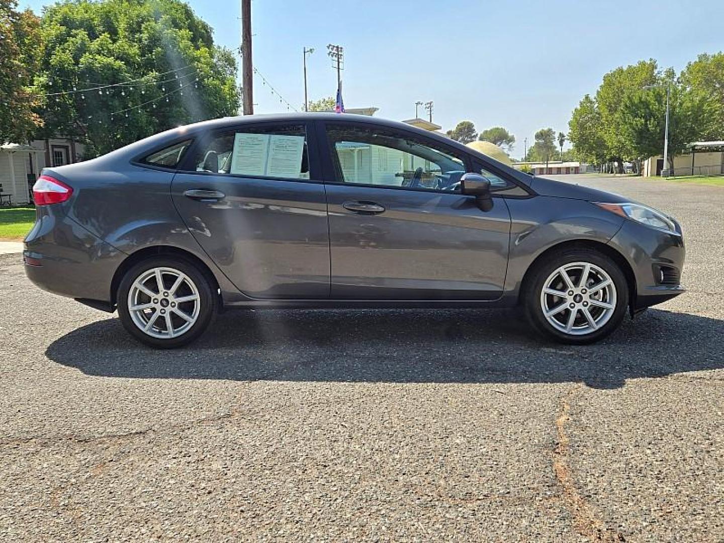 2019 GRAY Ford Fiesta (3FADP4BJ8KM) with an 4-Cyl 1.6 Liter engine, located at 246 E Walker St., Orland, 95963, (530) 865-5800, 39.747589, -122.178398 - Photo#8