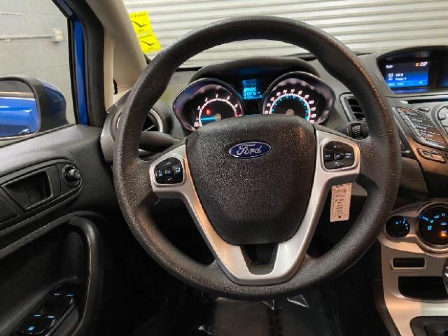 2019 blue Ford Fiesta (3FADP4EJ3KM) with an 4-Cyl 1.6 Liter engine, Automatic transmission, located at 412 Auto Vista Drive, Palmdale, 93551, (661) 945-0620, 34.592636, -118.136681 - Photo#9