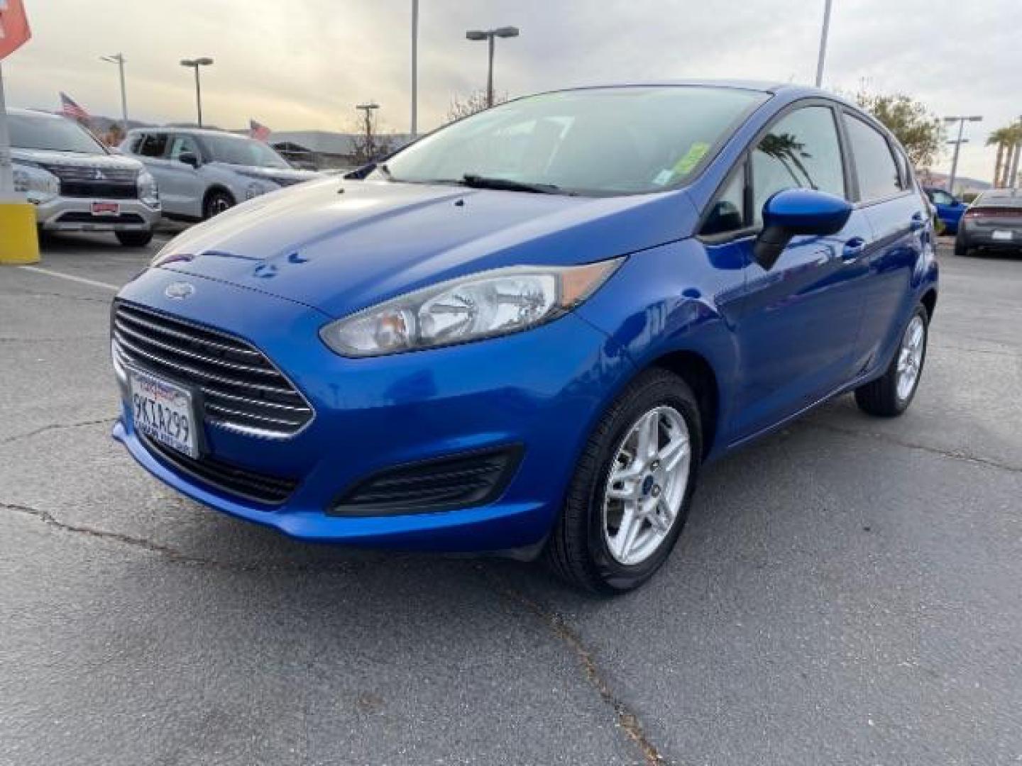 2019 blue Ford Fiesta (3FADP4EJ3KM) with an 4-Cyl 1.6 Liter engine, Automatic transmission, located at 412 Auto Vista Drive, Palmdale, 93551, (661) 945-0620, 34.592636, -118.136681 - Photo#2