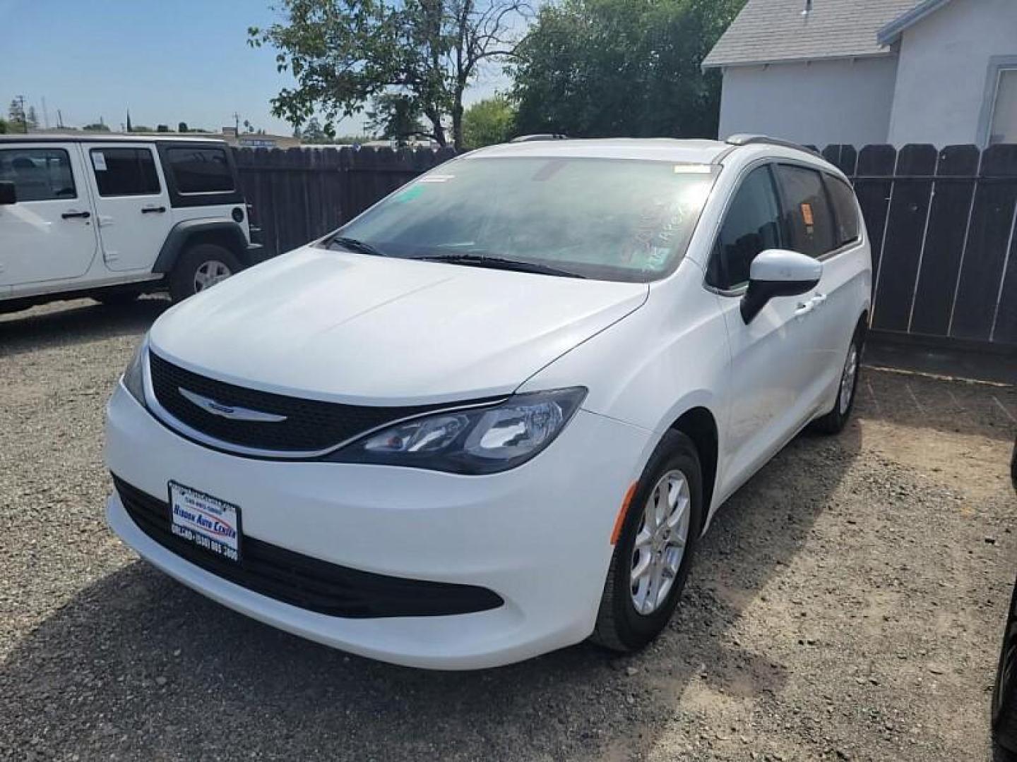 2020 WHITE Chrysler Voyager (2C4RC1DG4LR) with an V6 3.6 Liter engine, Automatic 9-Spd transmission, located at 246 E Walker St., Orland, 95963, (530) 865-5800, 39.747589, -122.178398 - Photo#0