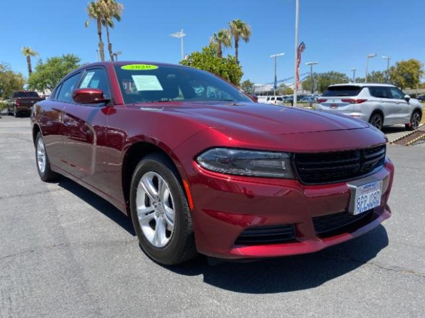 2020 MAROON Dodge Charger (2C3CDXBG9LH) with an V6 3.6 Liter engine, Automatic 8-Spd w/AutoStick transmission, located at 412 Auto Vista Drive, Palmdale, 93551, (661) 945-0620, 34.592636, -118.136681 - Photo#0