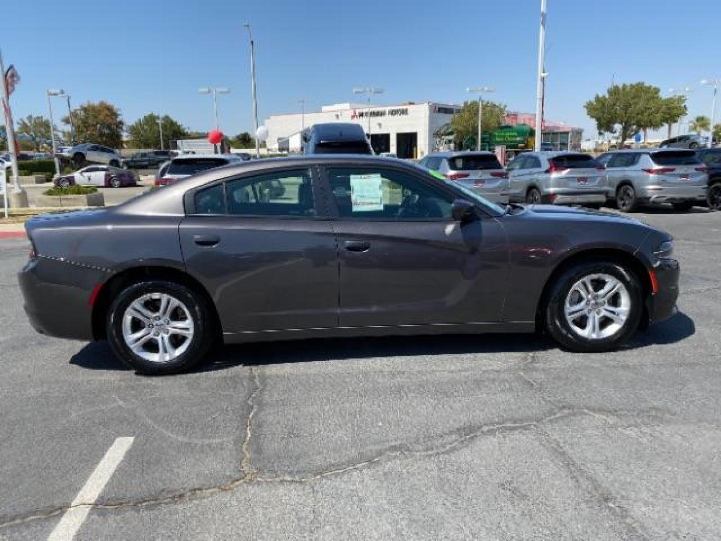 2021 GRAY Dodge Charger (2C3CDXBG4MH) with an V6 3.6 Liter engine, Automatic 8-Spd w/AutoStick transmission, located at 412 Auto Vista Drive, Palmdale, 93551, (661) 945-0620, 34.592636, -118.136681 - Photo#6