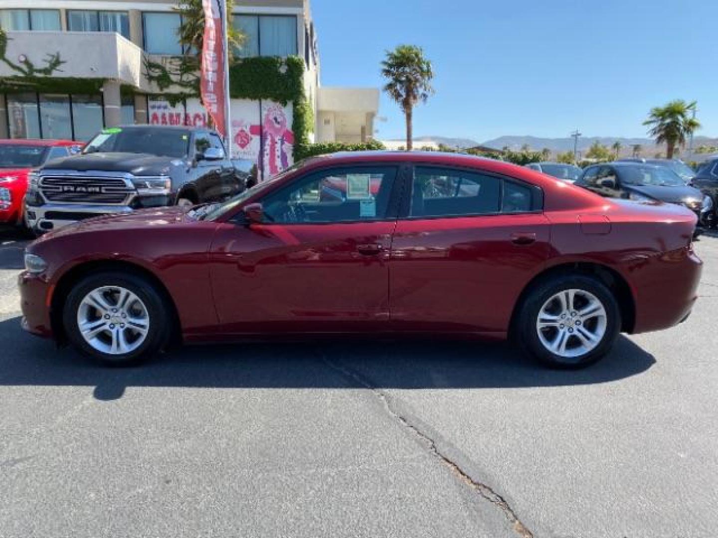 2021 RED Dodge Charger (2C3CDXBG7MH) with an V6 3.6 Liter engine, Automatic 8-Spd w/AutoStick transmission, located at 412 Auto Vista Drive, Palmdale, 93551, (661) 945-0620, 34.592636, -118.136681 - Photo#4