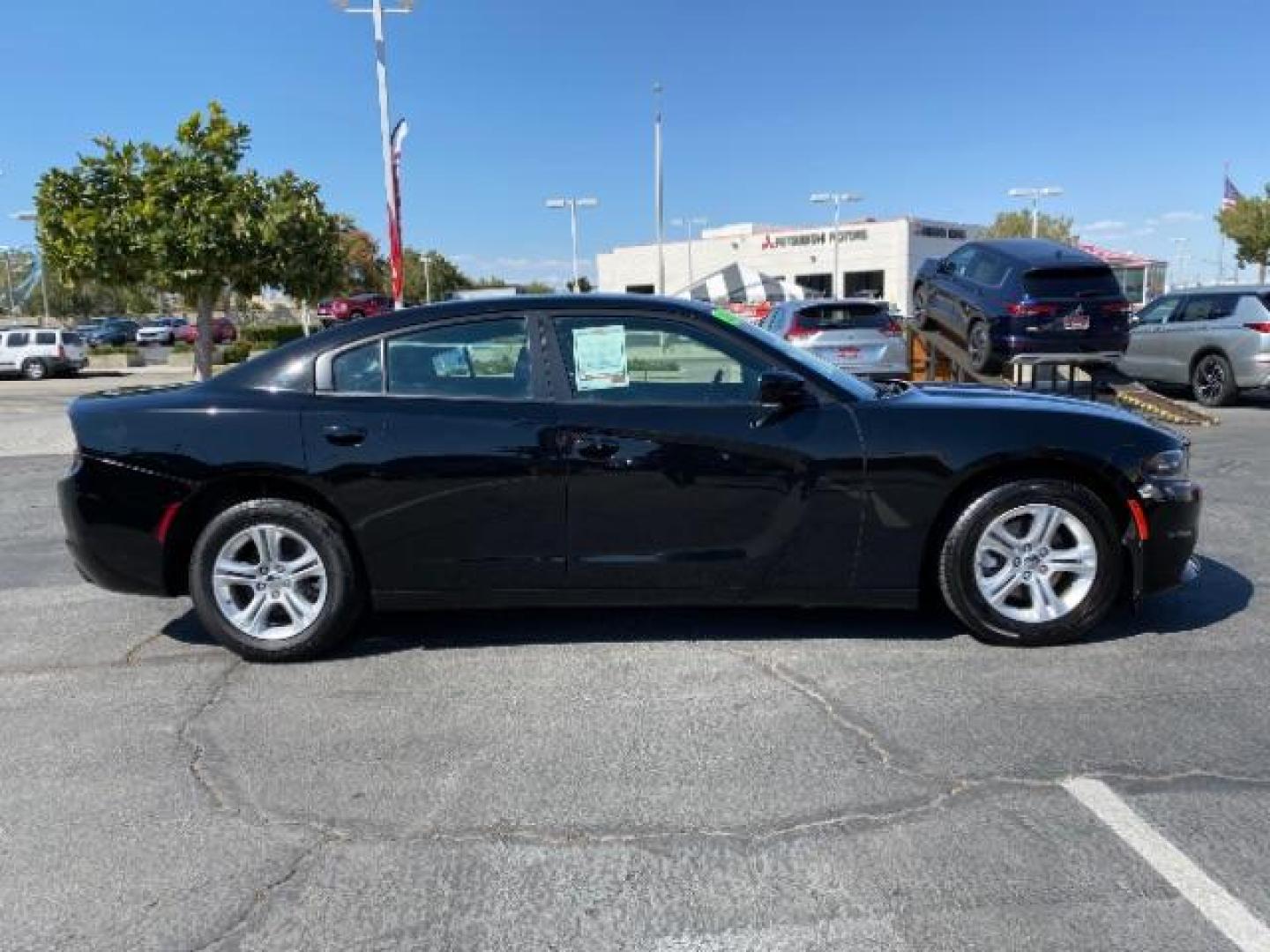 2021 BLACK Dodge Charger (2C3CDXBG4MH) with an V6 3.6 Liter engine, Automatic 8-Spd w/AutoStick transmission, located at 412 Auto Vista Drive, Palmdale, 93551, (661) 945-0620, 34.592636, -118.136681 - Photo#8