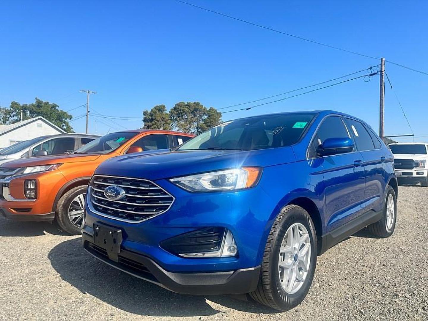 2021 BLUE Ford Edge (2FMPK4J97MB) with an 4-Cyl EcoBoost Turbo 2.0 Liter engine, Automatic 8-Spd transmission, located at 246 E Walker St., Orland, 95963, (530) 865-5800, 39.747589, -122.178398 - Photo#0